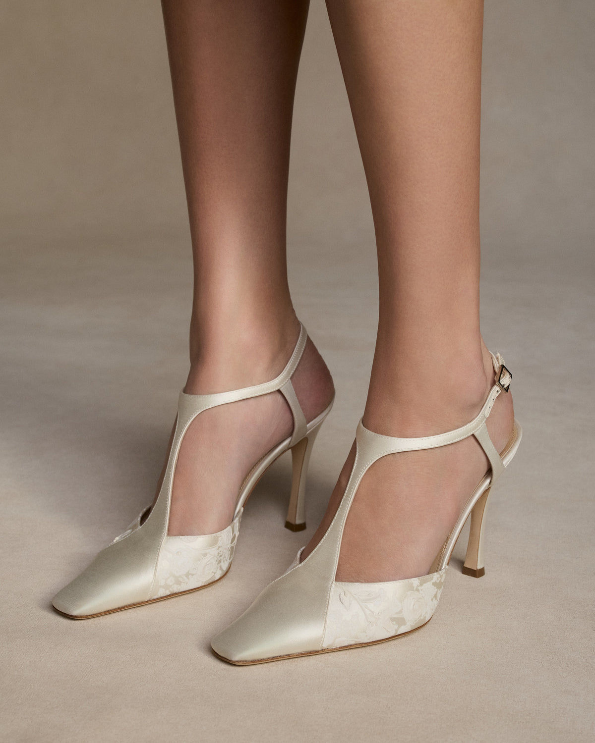 Ivory satin T-strap pump with square toe and pigment printed and hand painted detail. 100mm heel. Hand crafted in Italy.