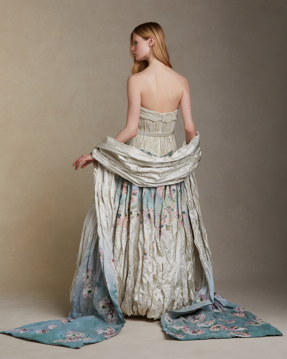 Silk metal stole with hand painted florals that softly degrade from end to end.Styled with Maeve gown