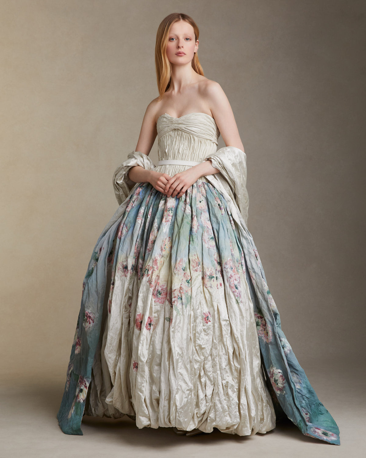 Silk metal stole with hand painted florals that softly degrade from end to end.Styled with Maeve gown