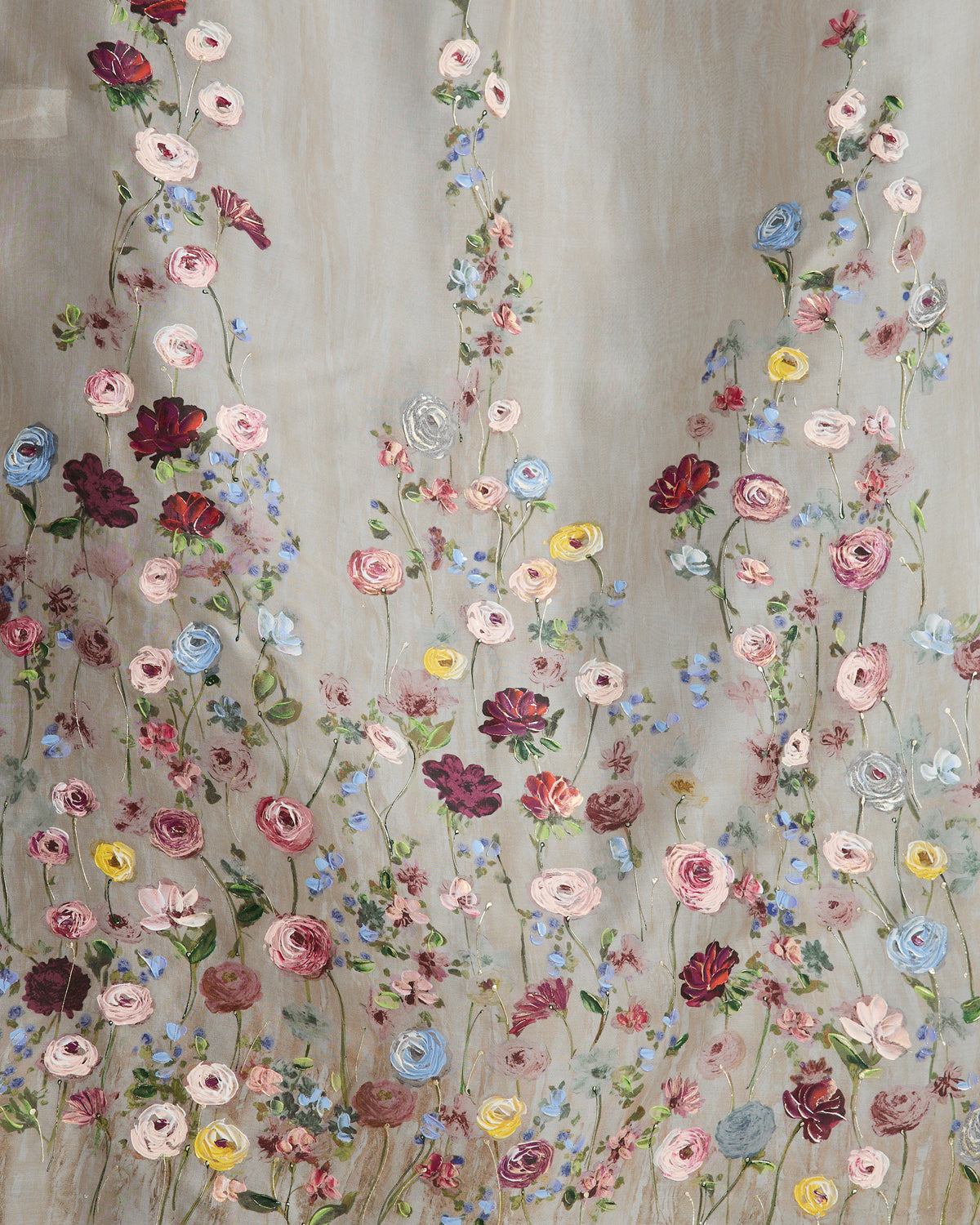 Cathedral length silk organza handkerchief veil with printed watercolor effect and hand painted florals that softly degrade towards the crown. Clean baby hem finish with covered & bound comb.
