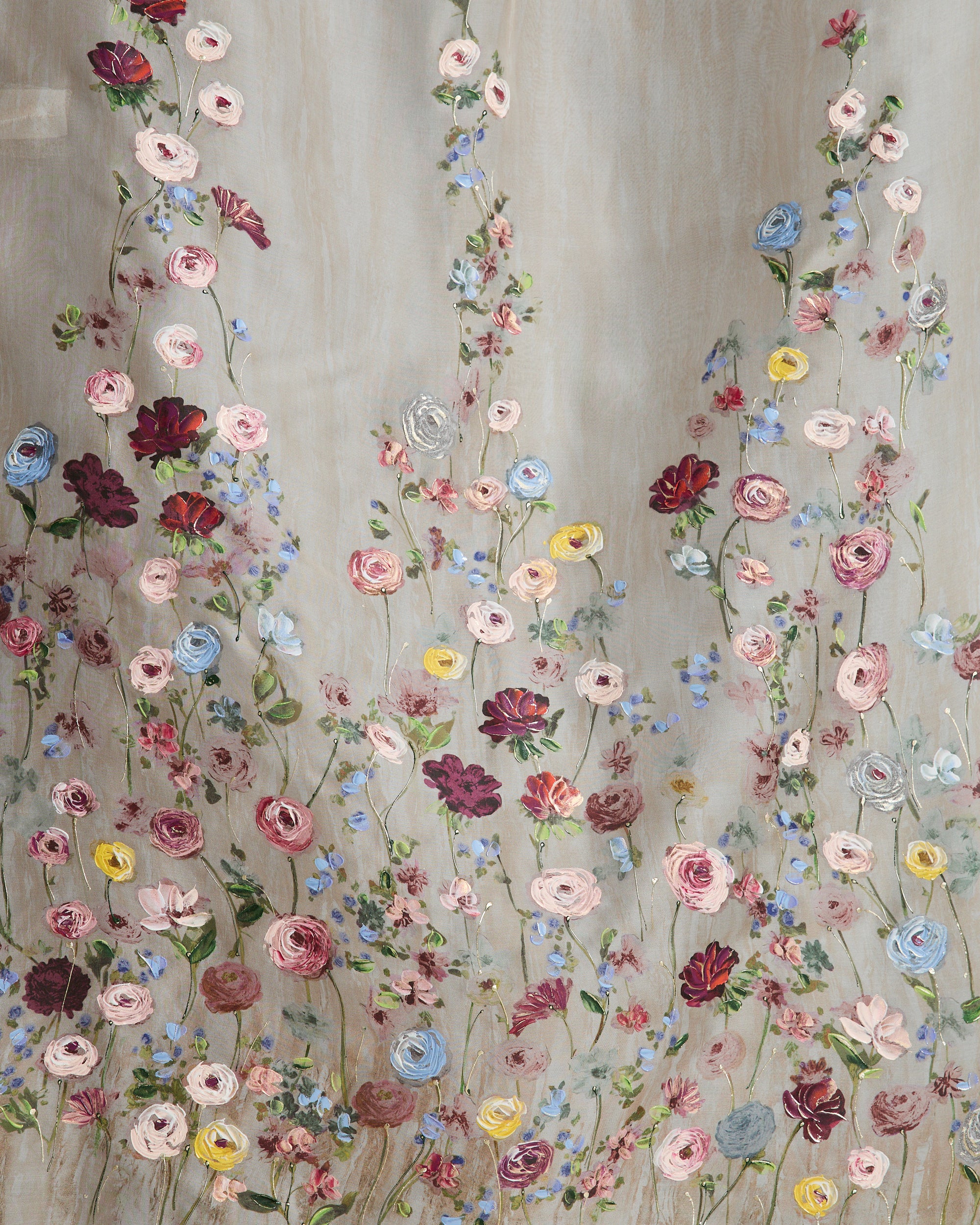 Cathedral length silk organza handkerchief veil with printed watercolor effect and hand painted florals that softly degrade towards the crown. Clean baby hem finish with covered &amp; bound comb.