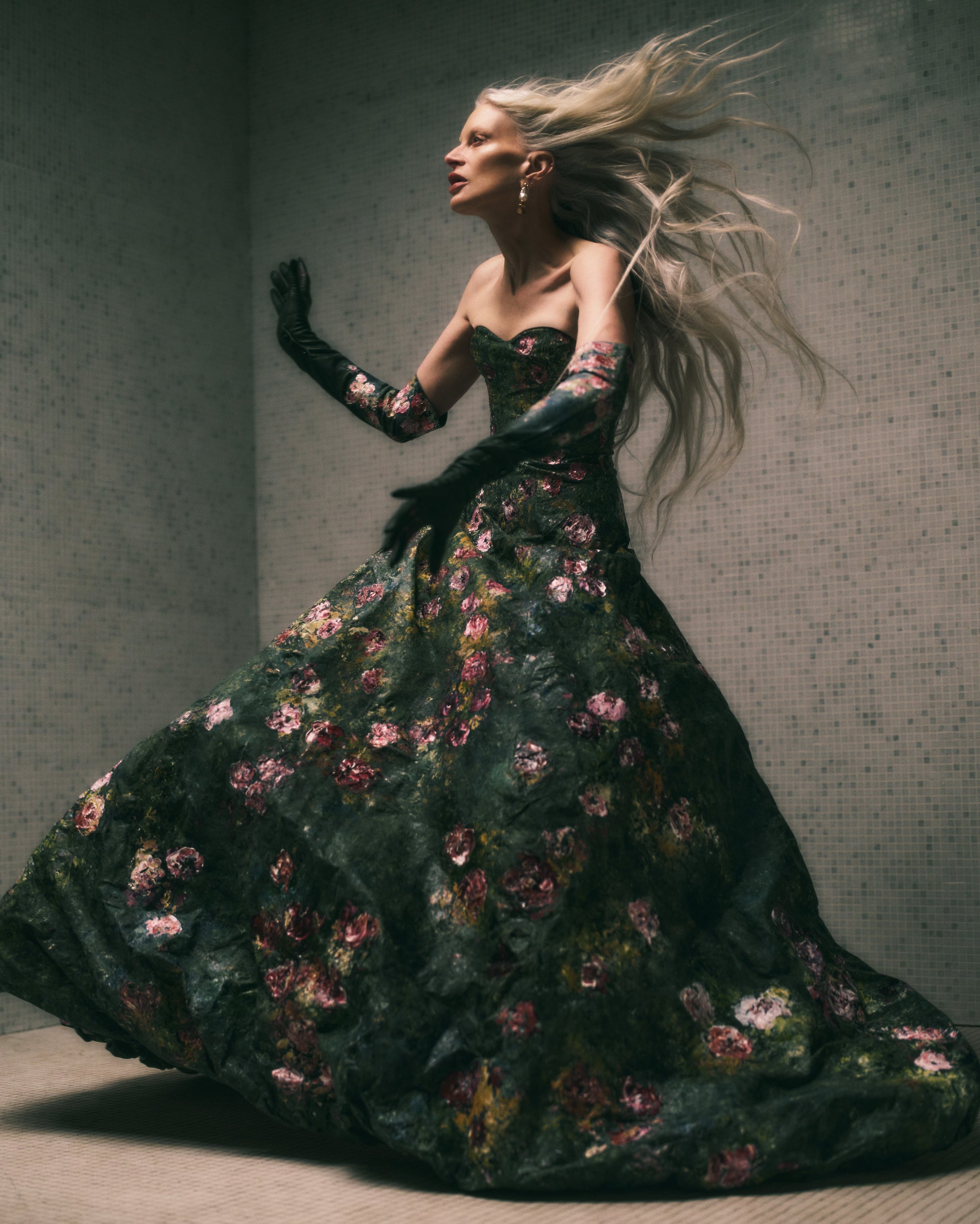 Floral hand painted silk organza strapless ballgown with soft sweetheart neckline. Boned internal bustier, internal grosgrain belt and invisible zip closure at center back.