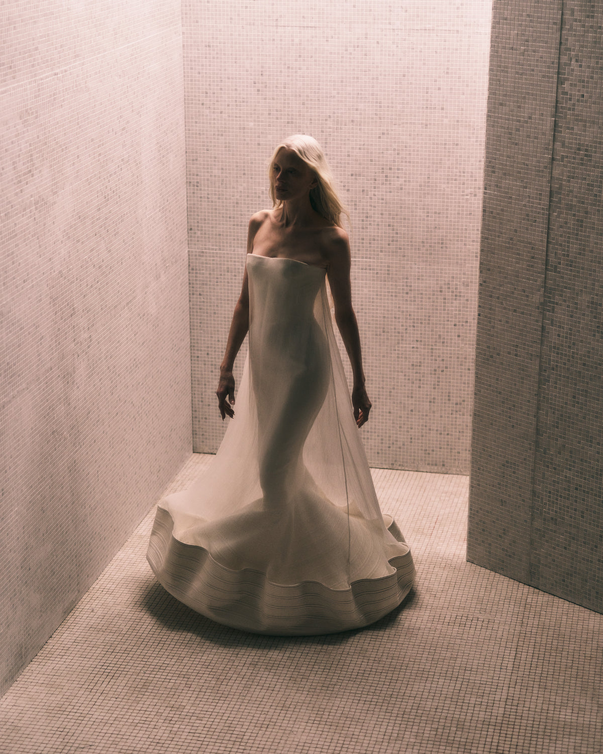 Silk wool twill fluted trapeze gown with crinkle organza overlay and trapunto stitch detailing