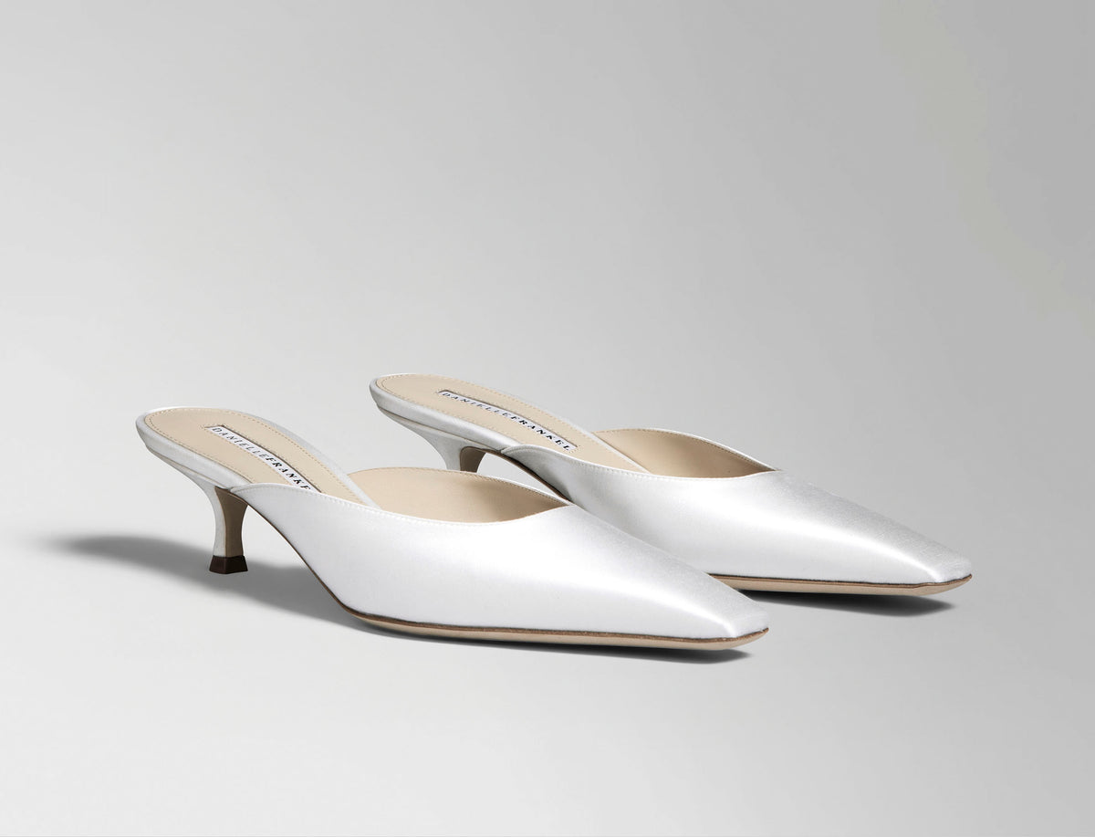 Ivory satin square toe mule with 50 mm kitten heel. Hand crafted in Italy.