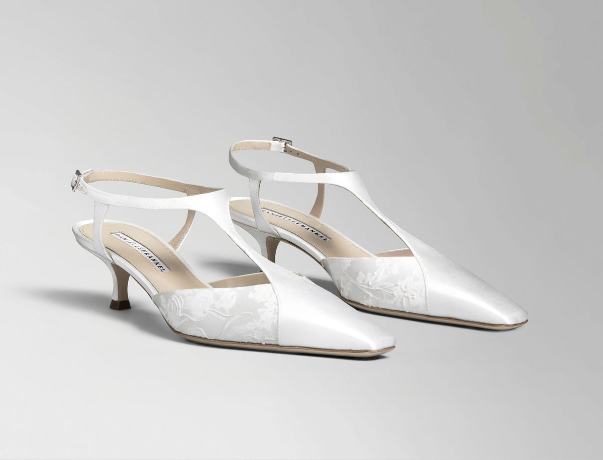 Ivory satin T-strap pump with square toe and pigment printed and hand painted detail. 50 mm kitten heel. Hand crafted in Italy.