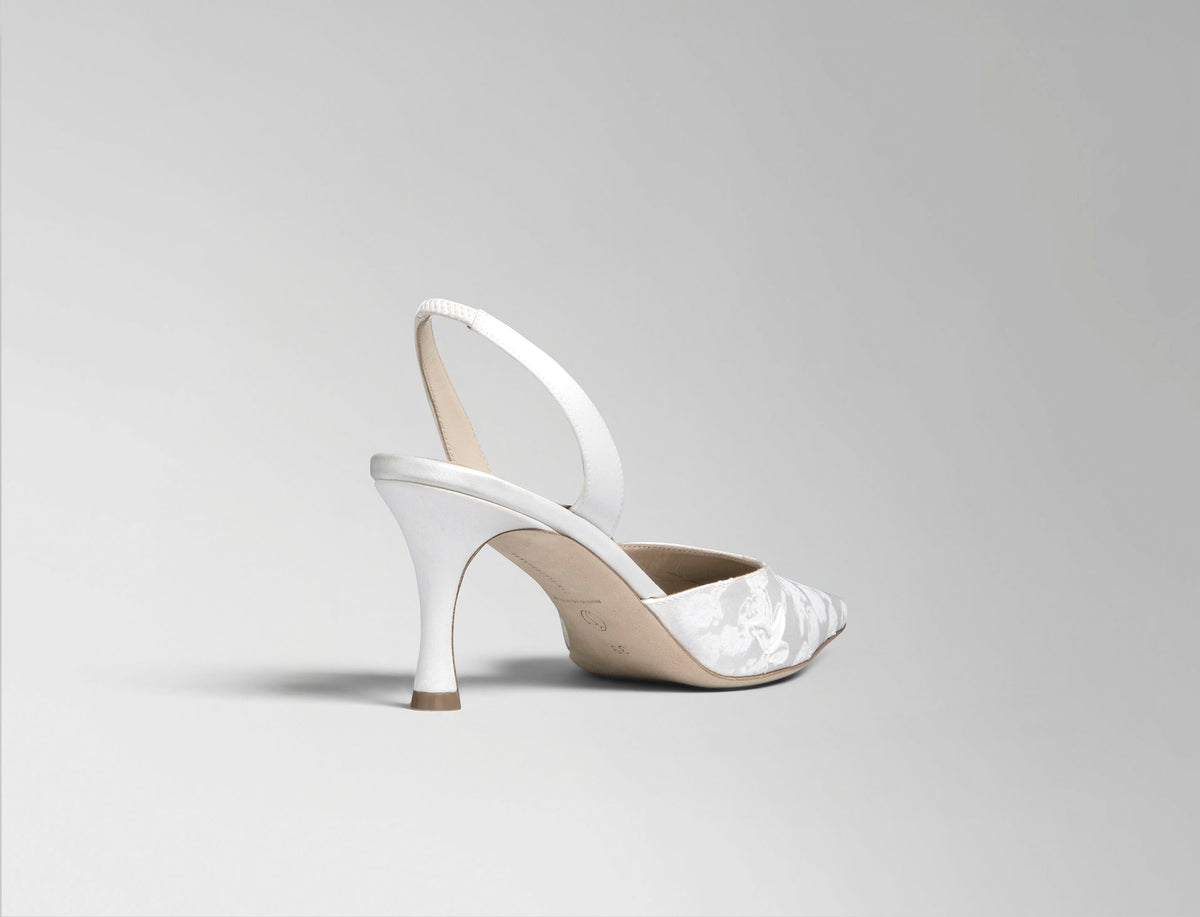 Classic slingback crafted in Italy of pigment printed & hand painted ivory satin. Elongated round toe and 75mm heel.