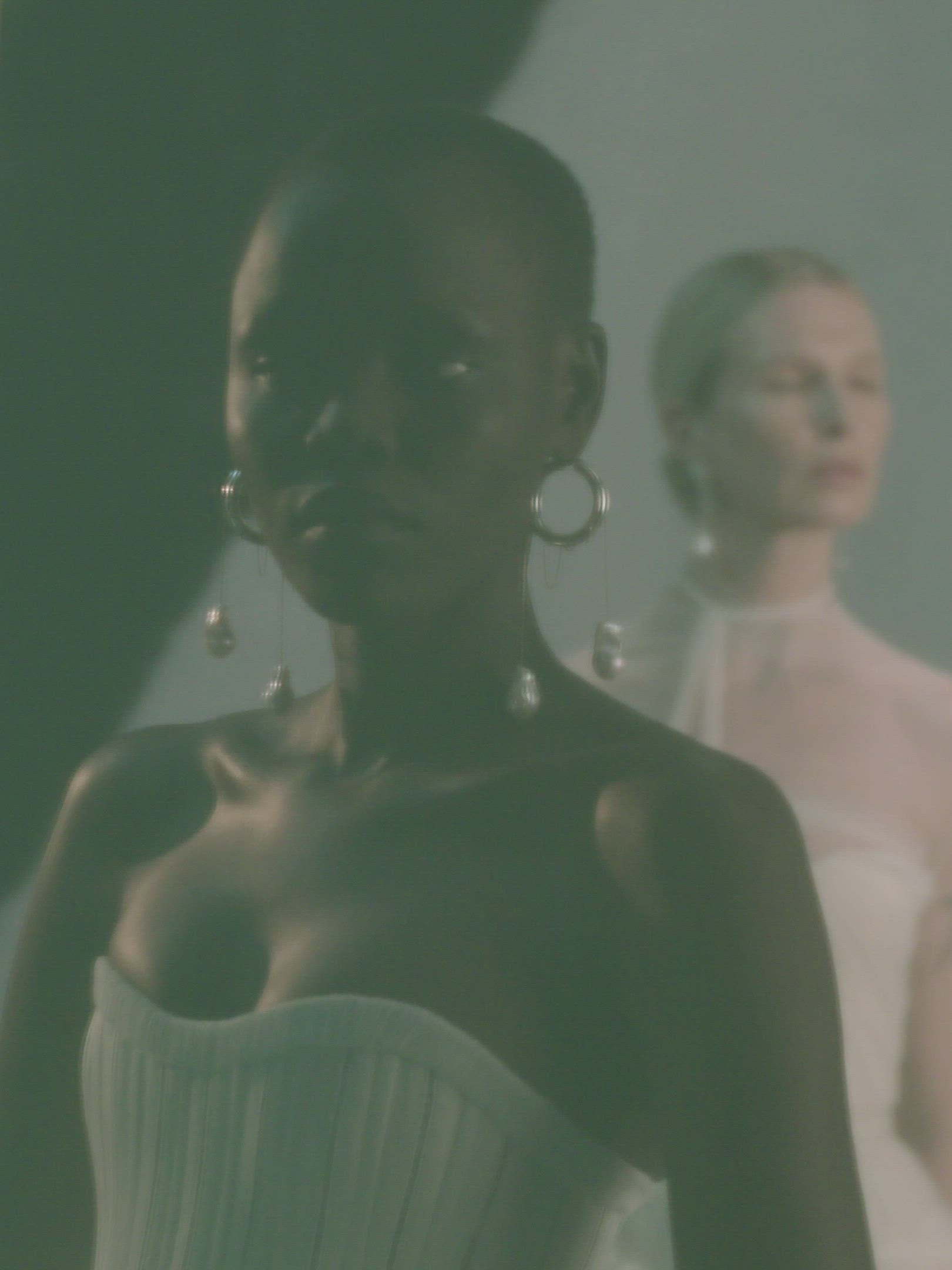 Pleated georgette trim bustier with contrasting dual optic and ivory lace scarf detail with button offoption. Center back hook and eye closure.