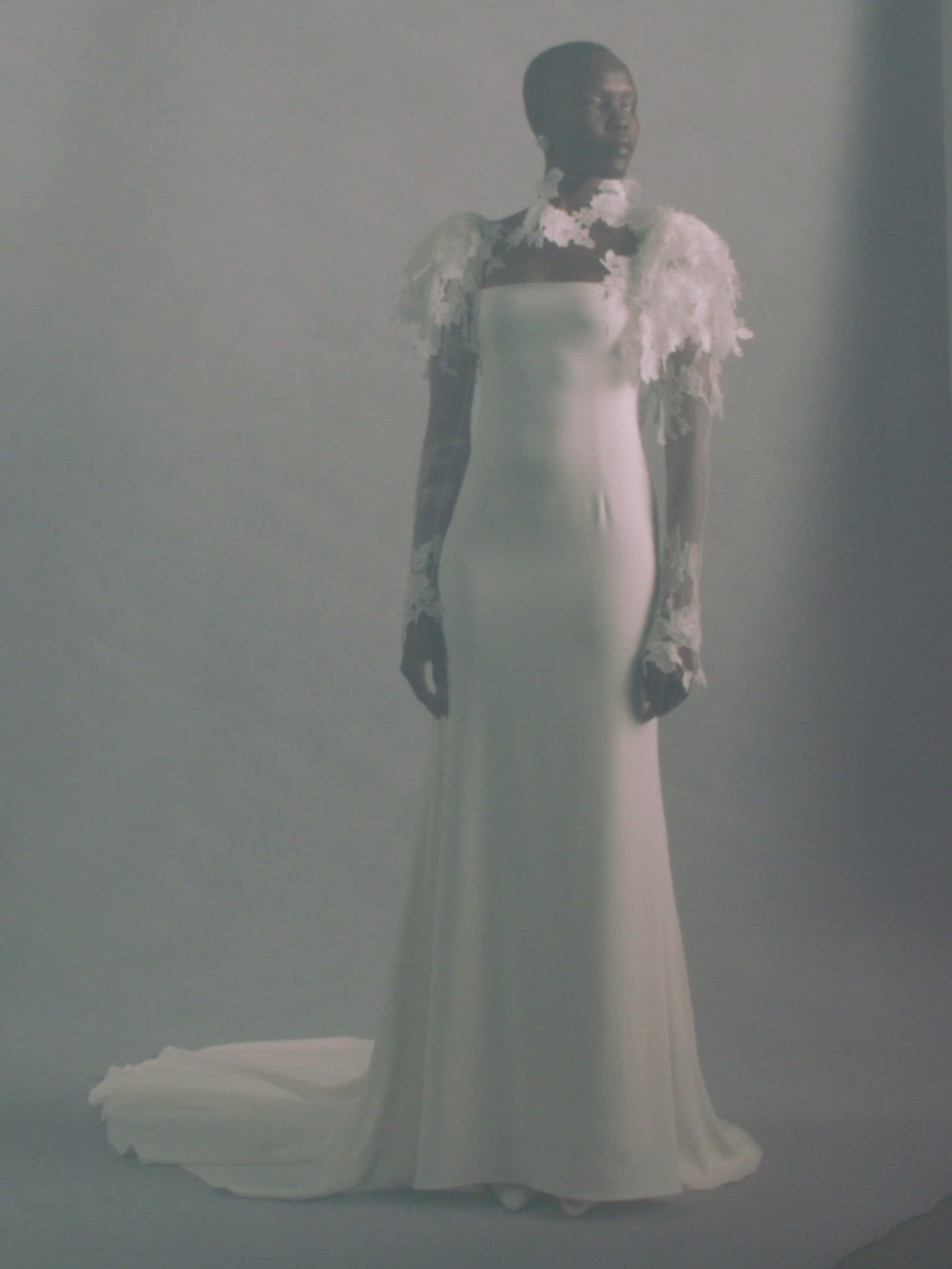 Cady square neck gown with Chantilly and corded Lace appliqué sleeves.﻿