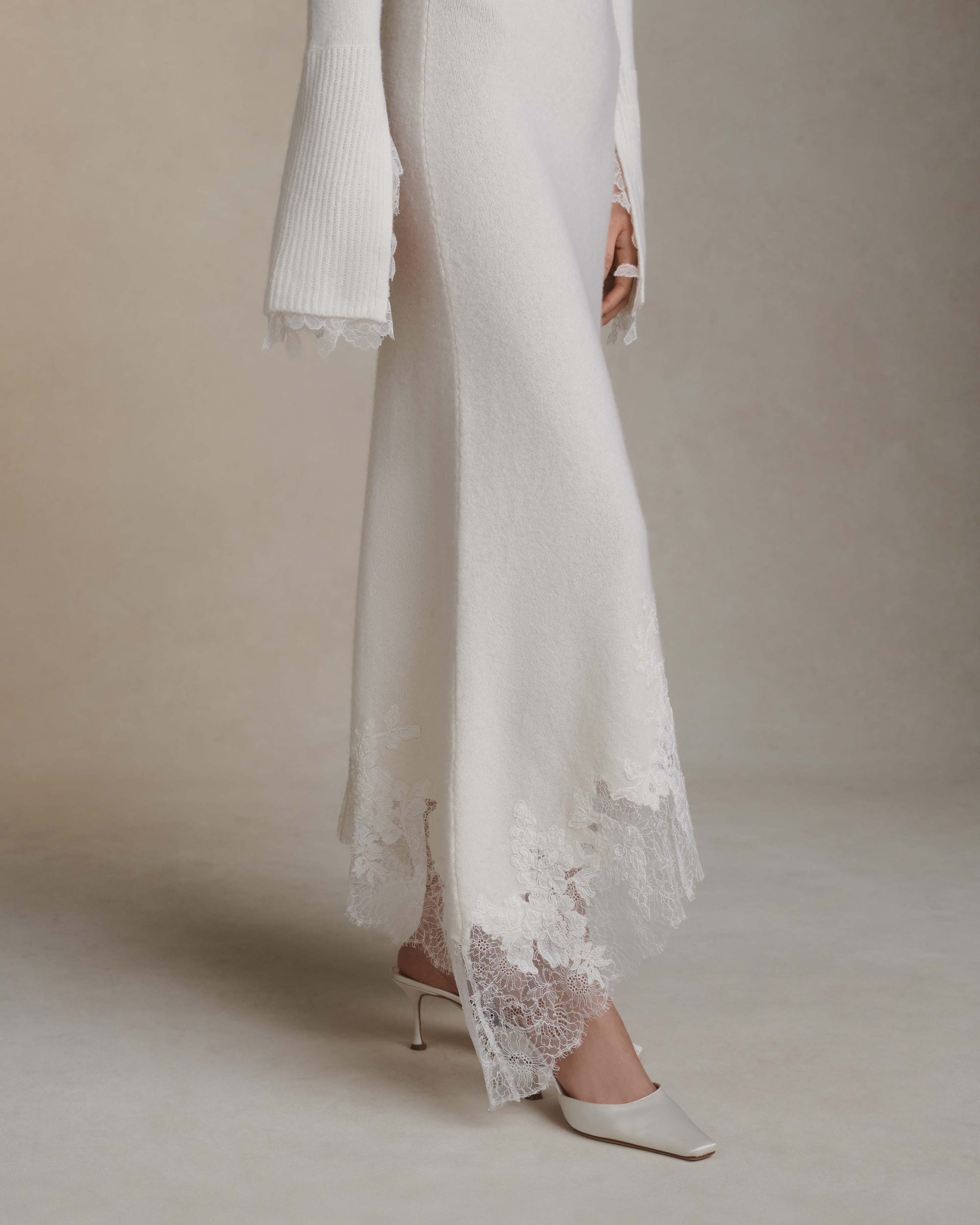 Silk cashmere midi length dress. Squared camisole neckline and hand appliquéd corded lace upon chantilly lace at hem.Fits true to size: 0/2 = XS2/4 = S6/8 = M8/10 = L10/12 = XL Styled with Jo cardigan