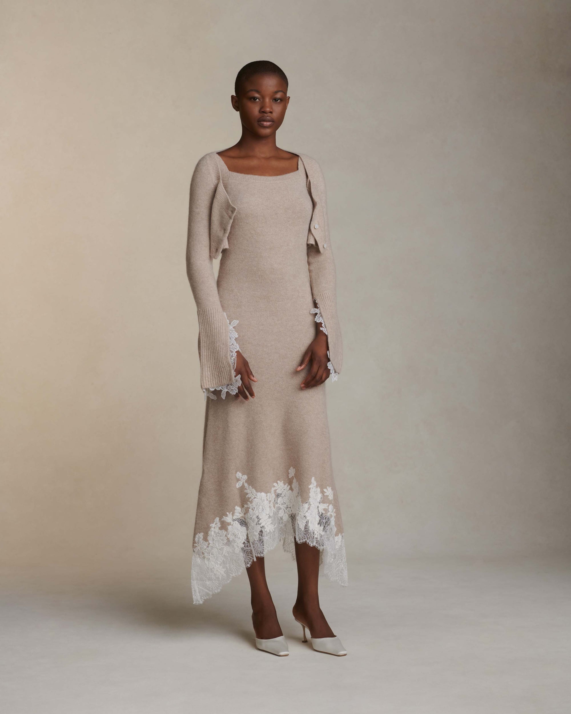 Silk cashmere midi length dress. Squared camisole neckline and hand appliquéd corded lace upon chantilly lace at hem.Fits true to size: 0/2 = XS2/4 = S6/8 = M8/10 = L10/12 = XL Styled with Jo cardigan