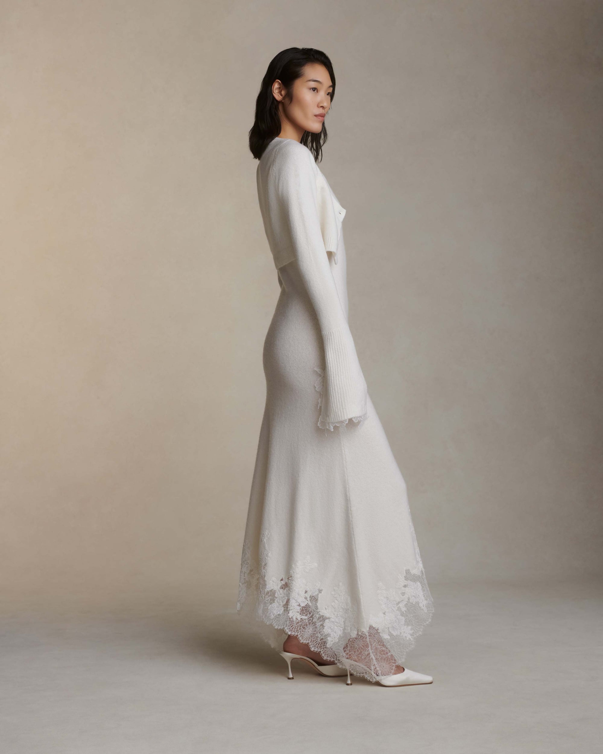 Silk cashmere midi length dress. Squared camisole neckline and hand appliquéd corded lace upon chantilly lace at hem.Fits true to size: 0/2 = XS2/4 = S6/8 = M8/10 = L10/12 = XL Styled with Jo cardigan