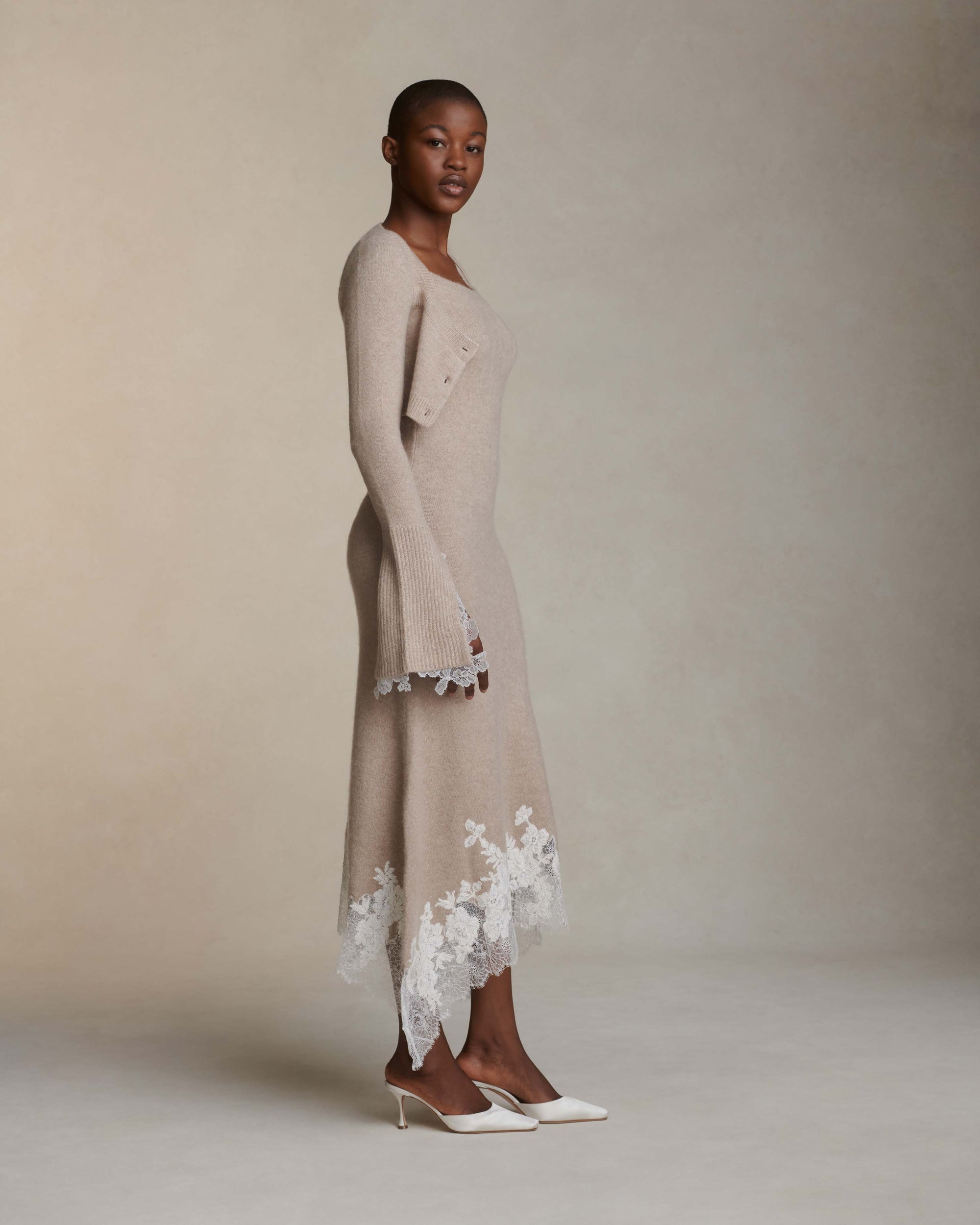 Silk cashmere midi length dress. Squared camisole neckline and hand appliquéd corded lace upon chantilly lace at hem.Fits true to size: 0/2 = XS2/4 = S6/8 = M8/10 = L10/12 = XL Styled with Jo cardigan
