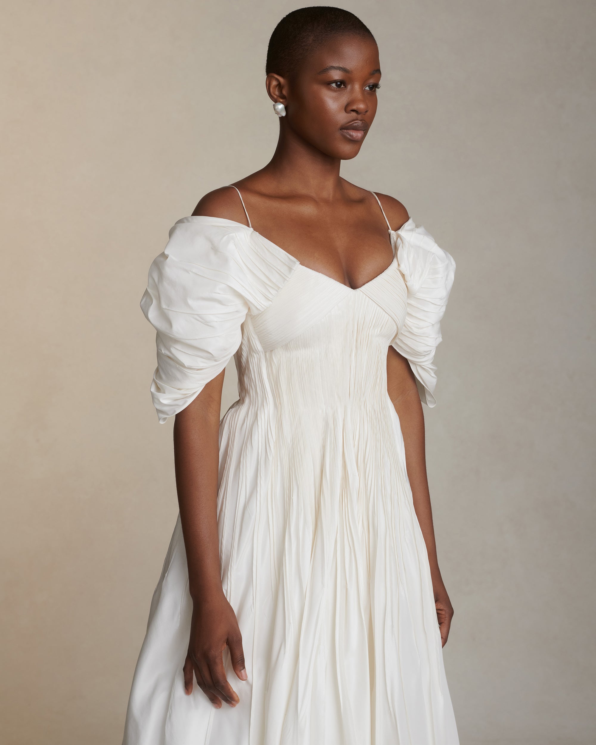 Tucked Silk Taffeta gown with draped sleeve detailPrinted version in Satin Twill