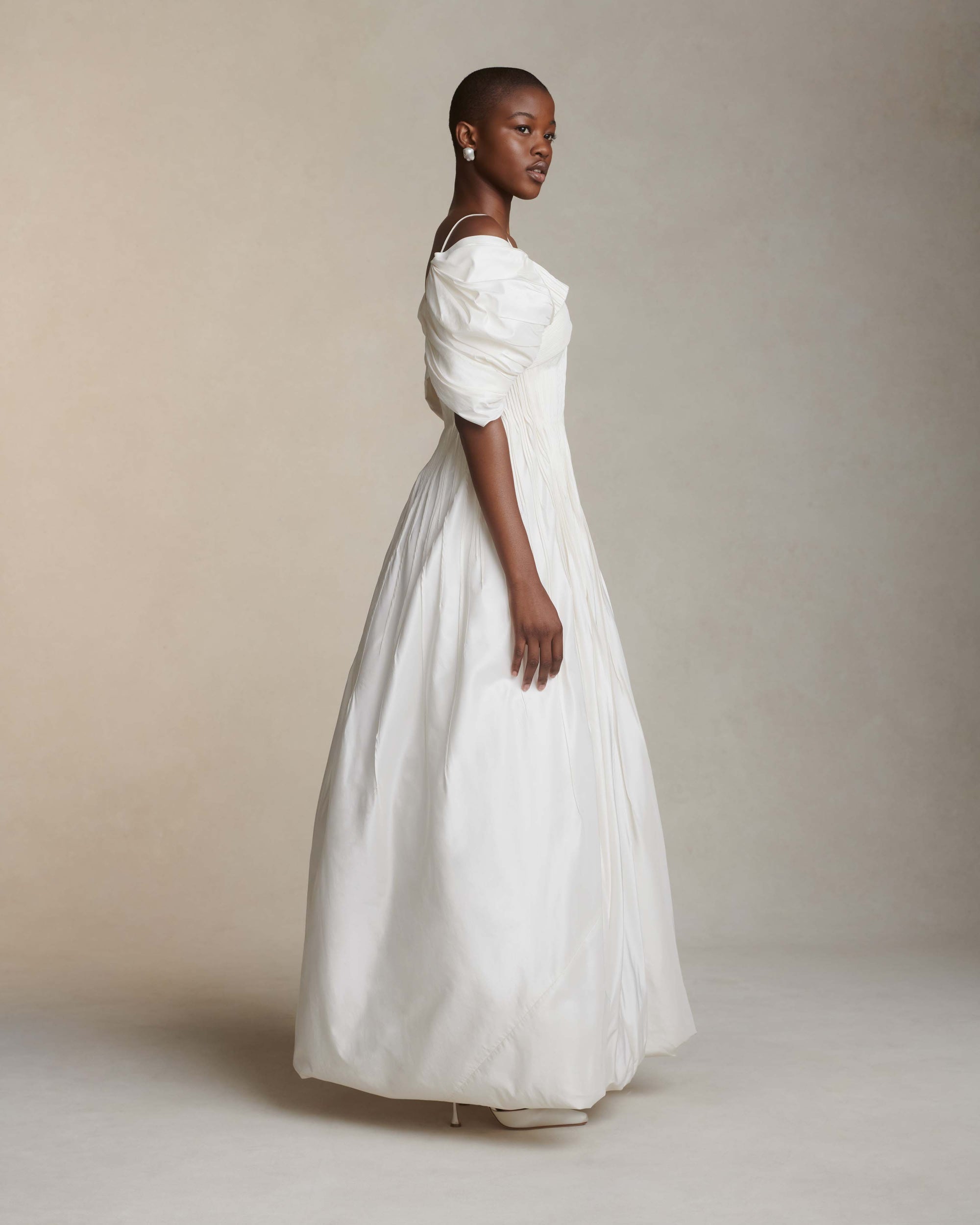 Tucked Silk Taffeta gown with draped sleeve detailPrinted version in Satin Twill