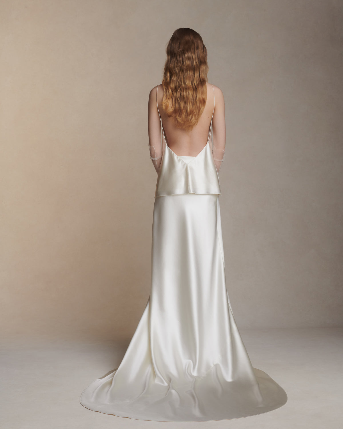 Bias cut silk wool camisole top with spaghetti straps and low back. Slip on styling.Styled with Dree skirt