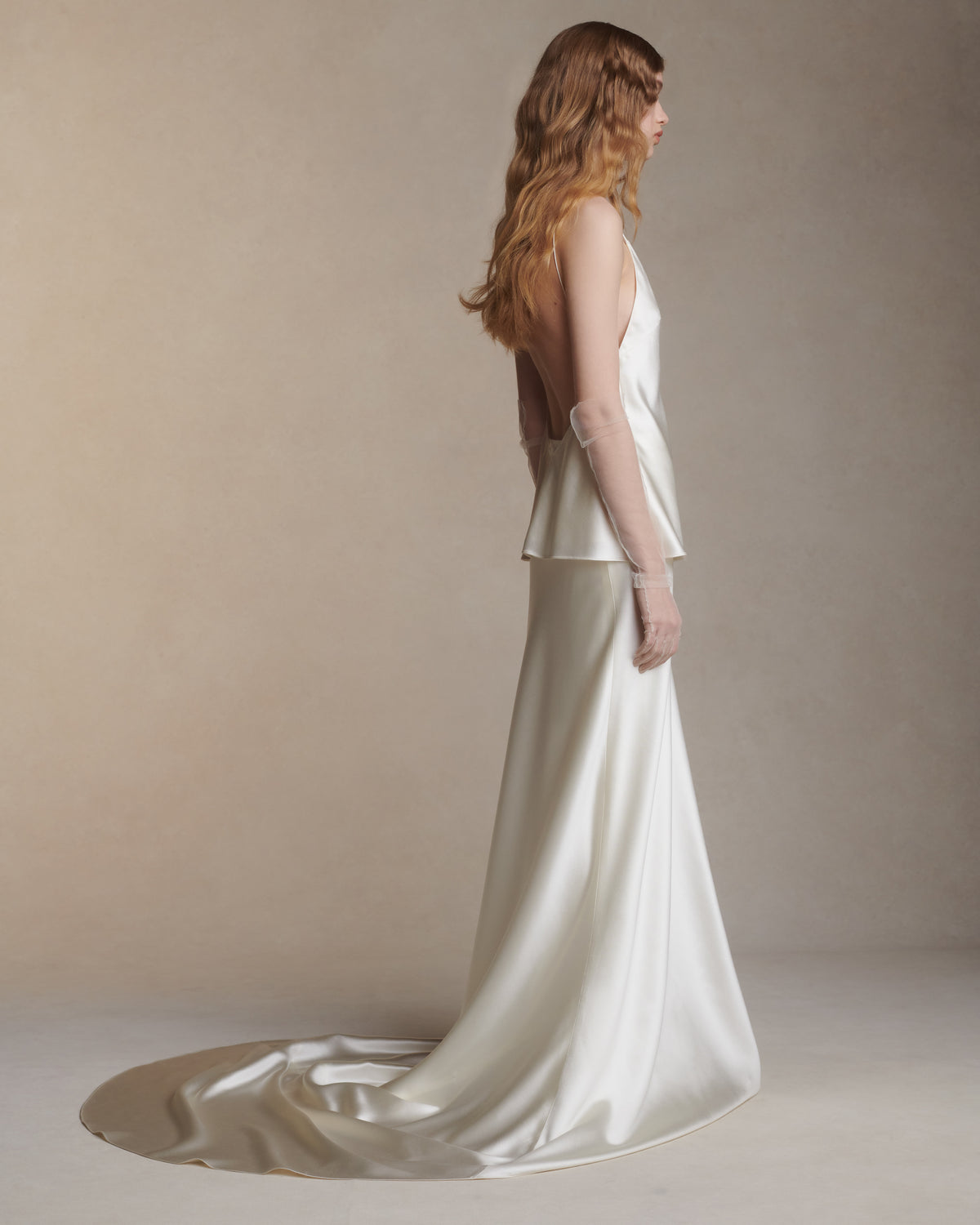 Bias cut silk wool camisole top with spaghetti straps and low back. Slip on styling.Styled with Dree skirt