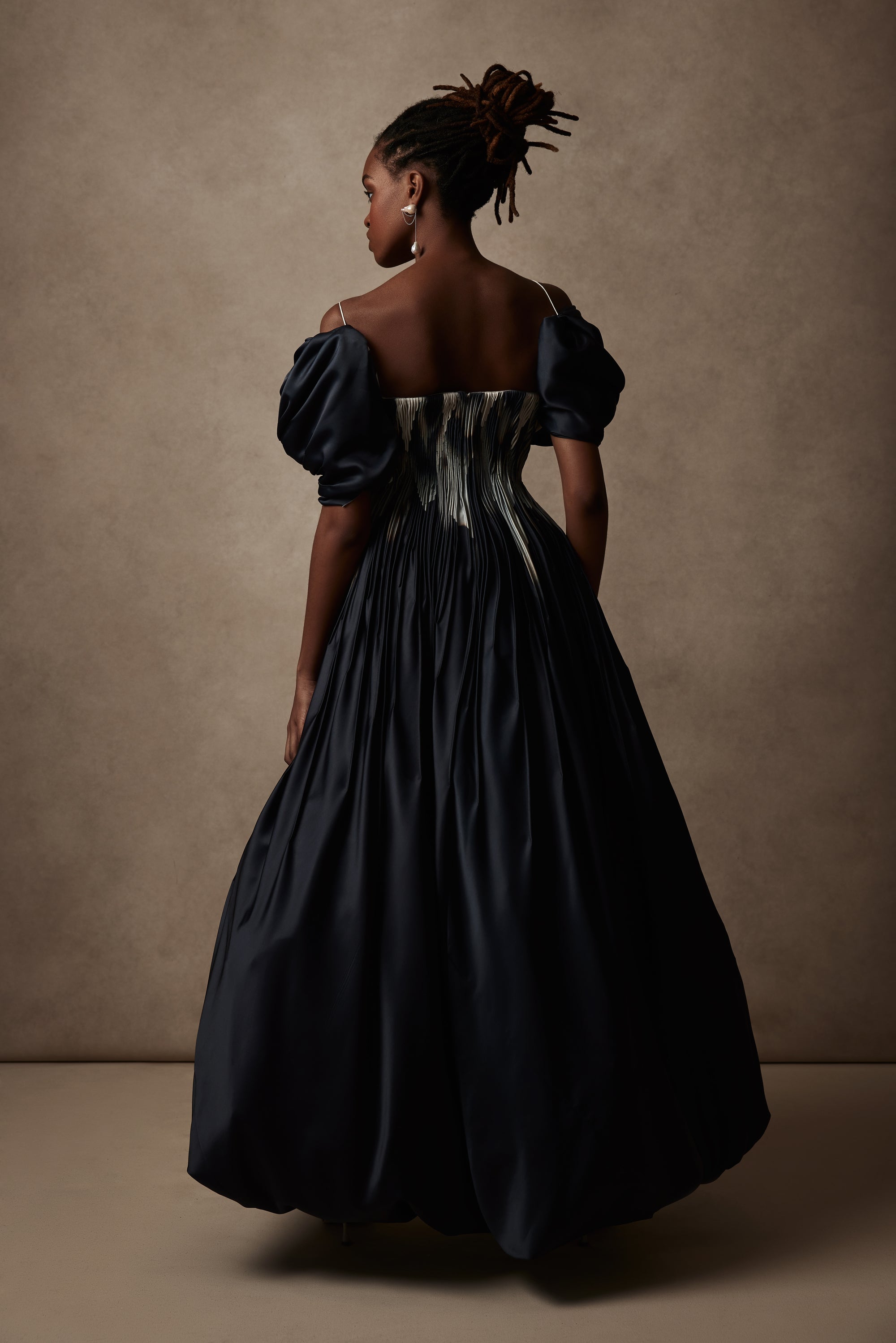 Tucked Silk Taffeta gown with draped sleeve detailPrinted version in Satin Twill