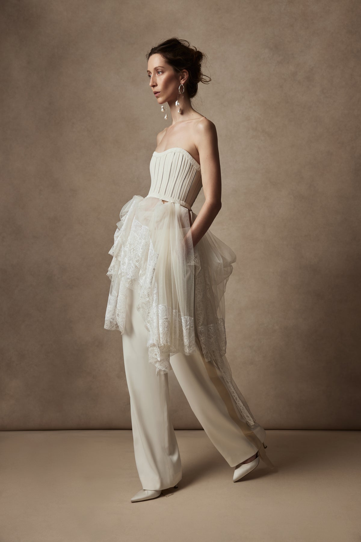 Pleated georgette trim bustier with contrasting dual optic and ivory lace scarf detail with button offoption. Center back hook and eye closure.