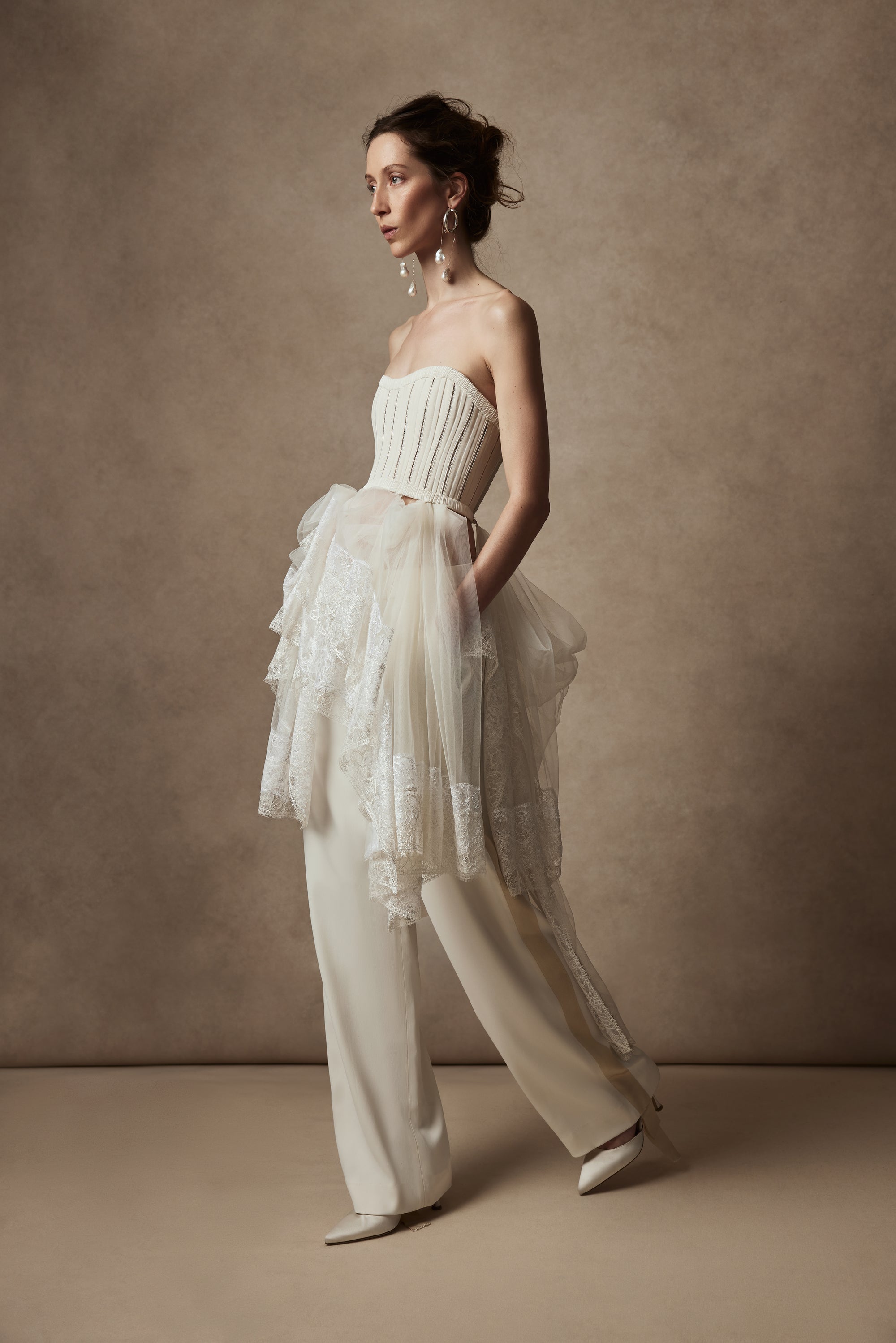 Pleated georgette trim bustier with contrasting dual optic and ivory lace scarf detail with button offoption. Center back hook and eye closure.