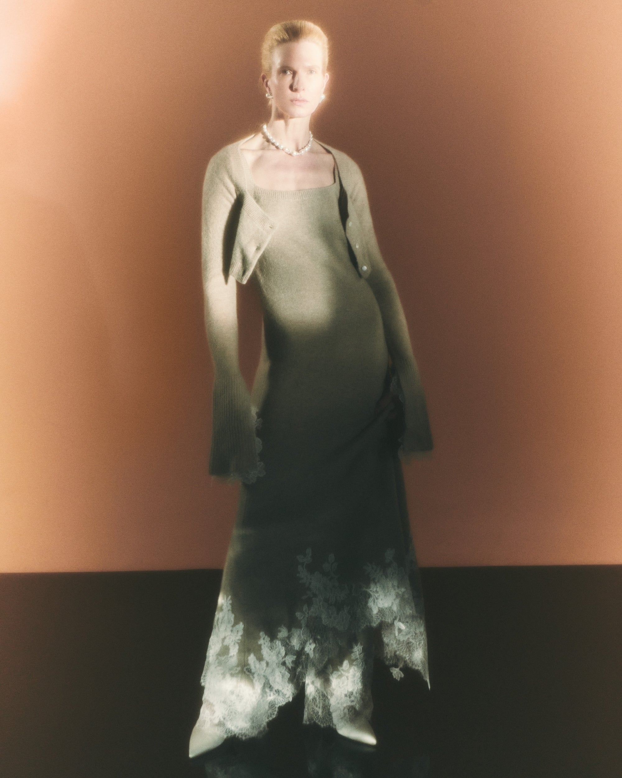 Silk cashmere midi length dress. Squared camisole neckline and hand appliquéd corded lace upon chantilly lace at hem.Fits true to size: 0/2 = XS2/4 = S6/8 = M8/10 = L10/12 = XL Styled with Jo cardigan
